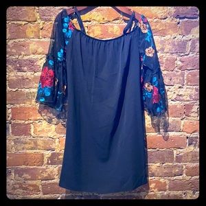 Off the shoulder embroidered little black dress